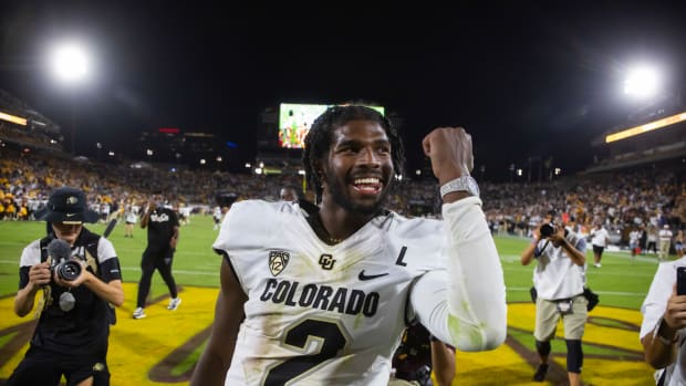Colorado Buffaloes quarterback Shedeur Sanders (2) celebrates after defeating the Arizona State Sun Devils at Mountain America Stadium, Home of the ASU Sun Devils